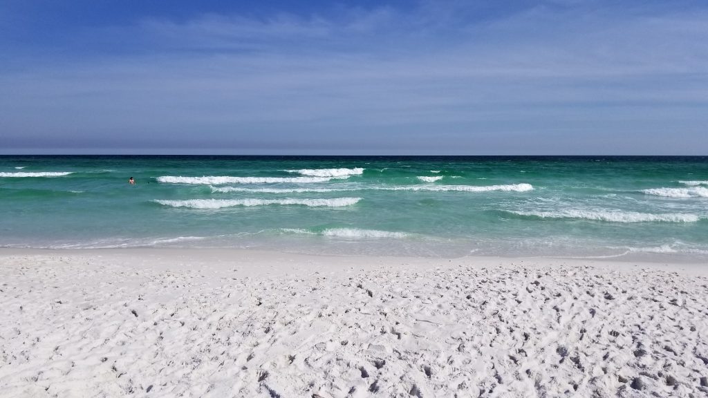 The sugar white sand is just a 2 minute walk from the vacation rental home
